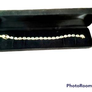 Silver and CZ tennis bracelet.